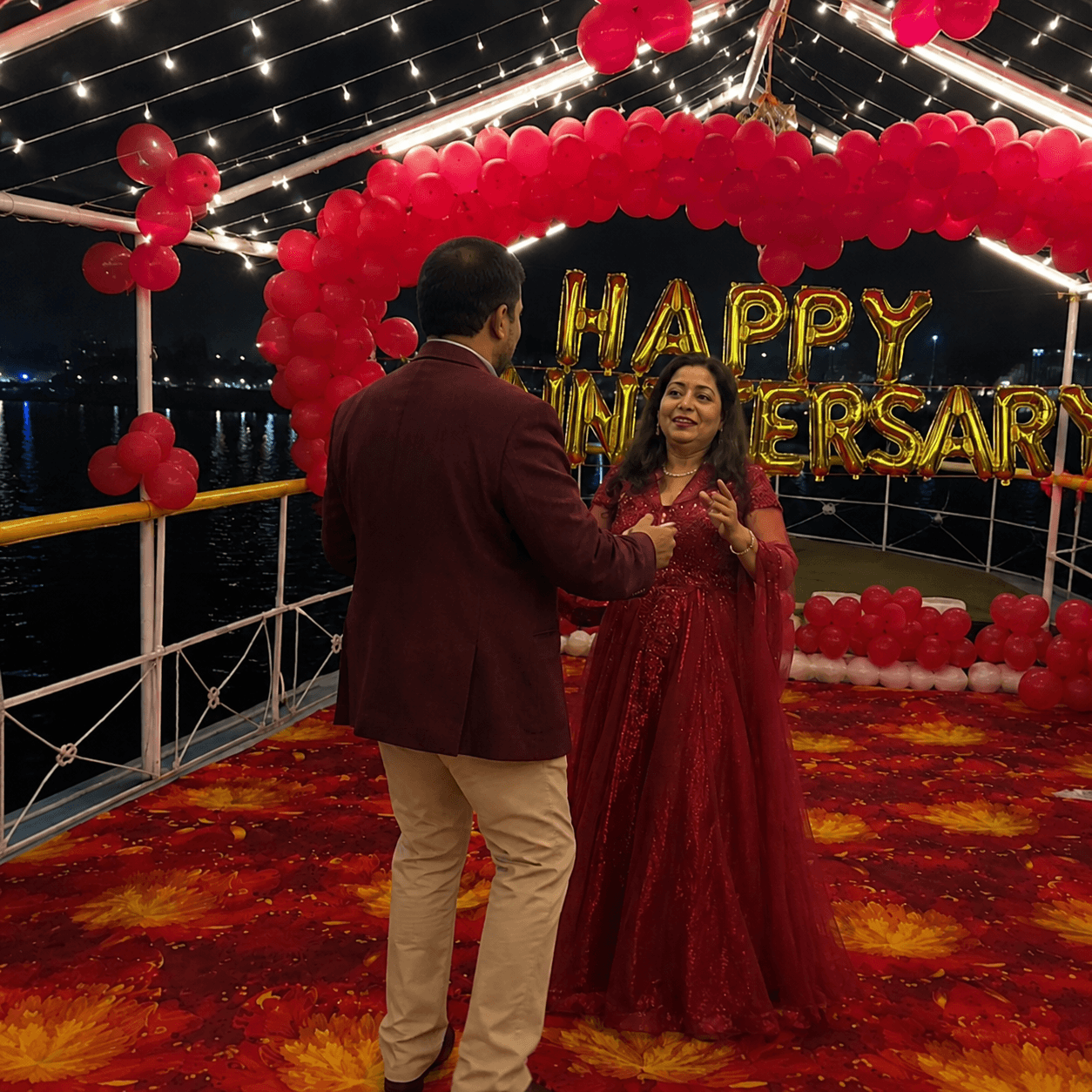 Couple dancing on deck
